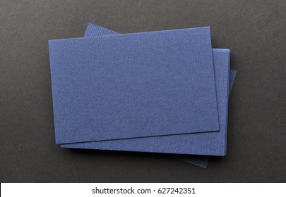 Empty Blue Business Card On Black Background