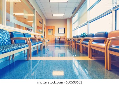 Empty Blue Interior Waiting Room At Medical Office