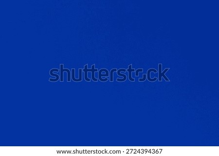 Empty blue sky texture background, full-frame real photograph.