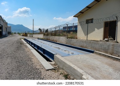 Empty Blue Weigh Bridge On Open Area