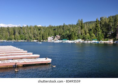 Empty Boat Docks Frame This View Of Lake Arrowhead In The Southern California Mountains.