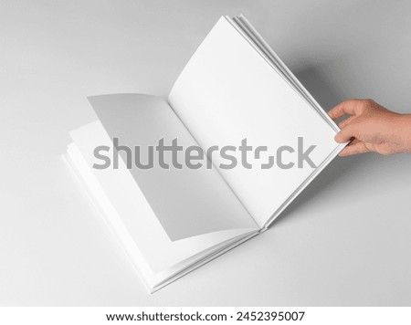 Empty Book Template on White Background, hands Open book with blank pages. Mock up for design