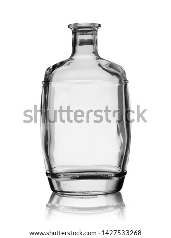 Empty bottle for brandy with reflection on a white background