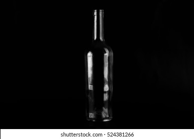 Empty Bottle On Black Background. Bottle Silhouette