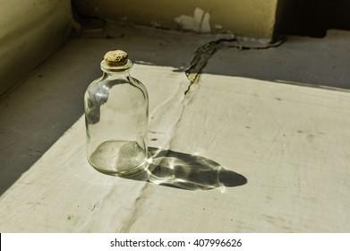 Empty bottle on the window