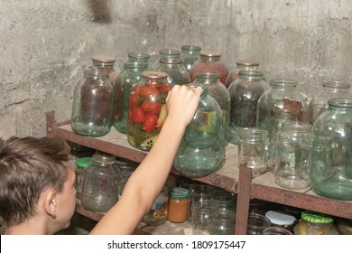 Empty Bottles And Jars In The Cellar In A Private House.