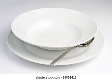 Empty Bowl Of Soup Isolated Over White