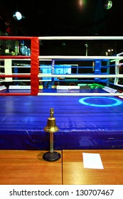 Empty Boxing Ring And Bell