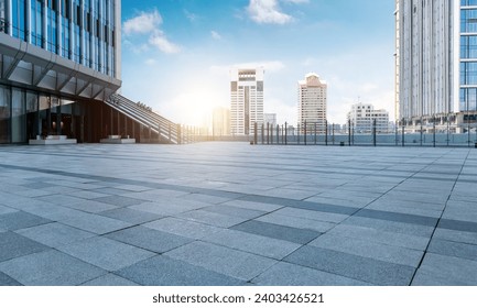 Empty brick road in front of office buildings - Powered by Shutterstock