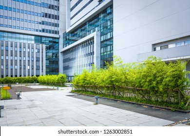 Empty Brick Road Nearby Office Building,china