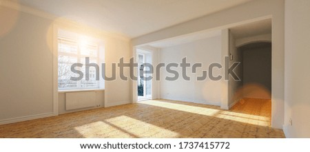 Empty bright white room in old building with balcony in berlin