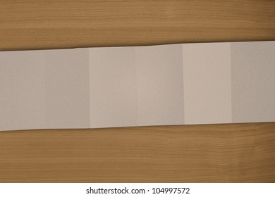 Empty brown Crumpled paper on wood background horizontal
