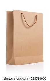 Empty brown paper bag isolated on white background.