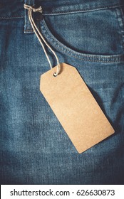 Empty Brown Paper Tag Of Jean. Vintage Color Effect Style.