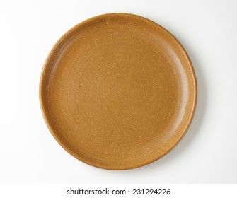 Empty Brown Plate On White Background