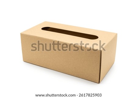 Empty brown tissue paper box isolated on white background with clipping path. Craft tissue box. Table Top Tissue Box.
