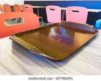 Empty Brown Tray On Table With Chairs In Cafeteria Or Food Court