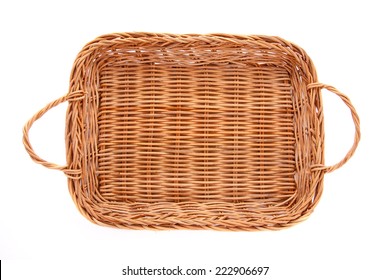 Empty brown wicker basket isolated on white background, top view