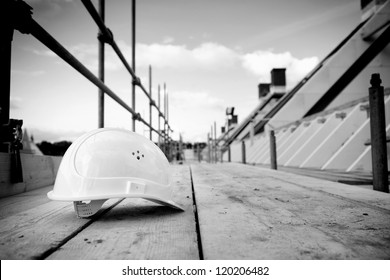 Empty Building Site With Left Helmet On Scaffold