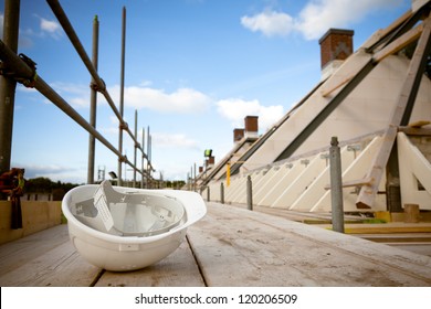 Empty Building Site With Left Helmet On Scaffold