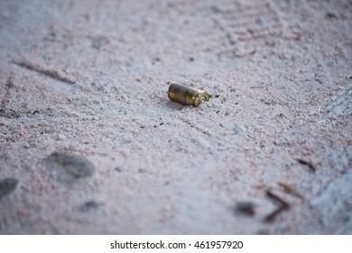 Empty Bullet Shells On Sand