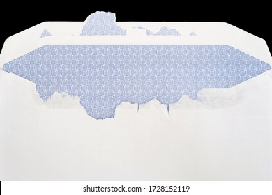 An Empty Business Envelope After Being Opened With Paper Tear Pattern Or Markings, On Black Background. An Envelope Ripped Open To Read An Urgent Or Important Letter Or Content.