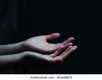 Empty businesswoman hand on black dark background office - Shutterstock ID 461668876