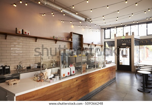 Empty cafe or bar interior,\
daytime