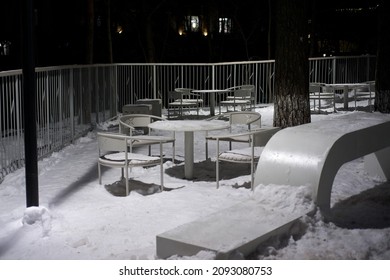 An empty cafe in the city park in winter night, Zvenigorod, Moscow region, Russia