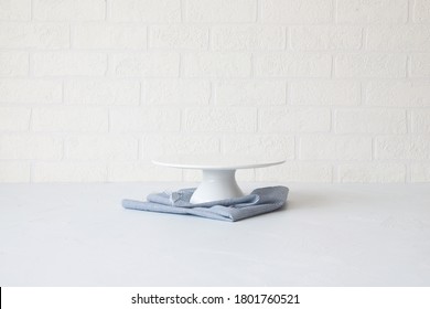 Empty Cake Stand With Blue Napkin	