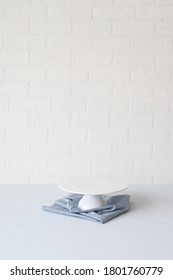 Empty Cake Stand With Blue Napkin	