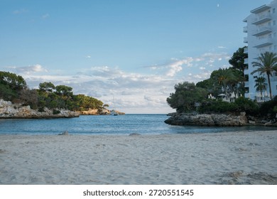 Empty Cala Ferrera beach in the evening panoramic view. Cala D'or on Mallorca in Spain.
