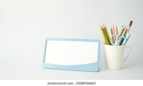 empty calendar with stationary, color pencils in a white cup  - Powered by Shutterstock