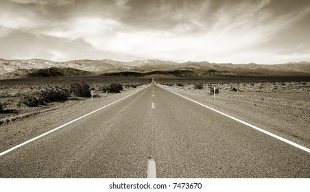 Empty californian highway through the desert