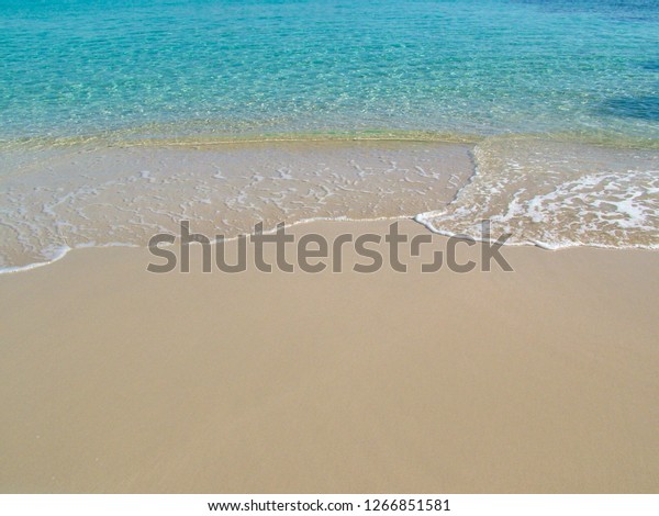 empty calm beautiful beach with clear turquoise water, Mallorca, Spain. Turquoise wallpaper mural. 