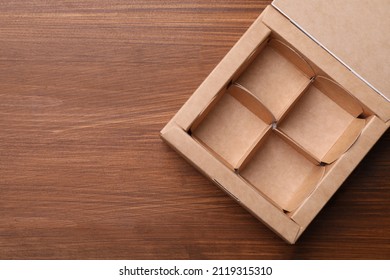 Empty Candy Box On Wooden Background, Top View. Space For Text