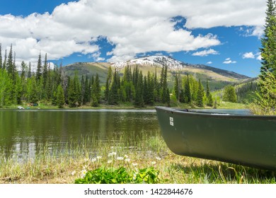 An Empty Canoe On The Shoe Of Pearl Lake, Colorado.  