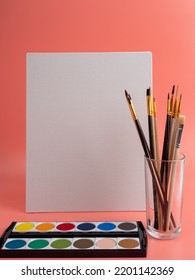 Empty canvas, tools and brushes. Place for text. Close-up.