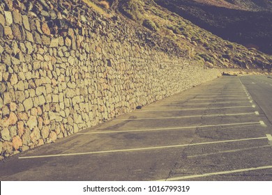 Empty car parking lines in the mountains