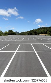 Empty Car Parking Lot With White Mark