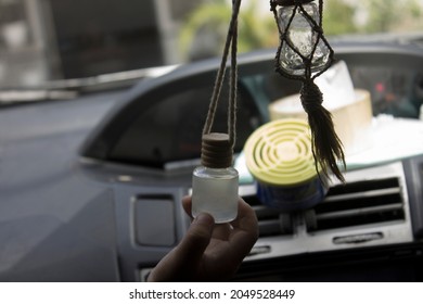 Empty car perfume bottle as car interior