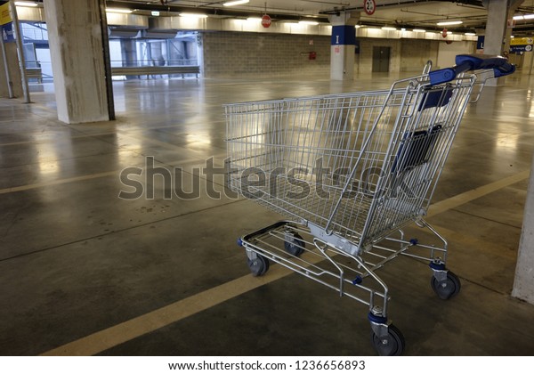 empty cart in the covered\
parking lot