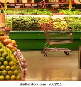 Empty Cart In The Produce Aisle