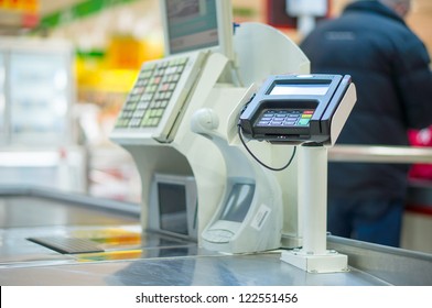 Empty Cash Desk With Terminal In Supermarket