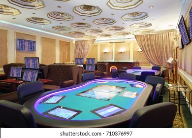 Empty Casino With Modern Electronic Poker Table And Computers For Gaming