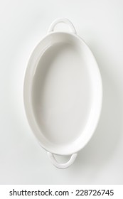 Empty Casserole Dish On White Background