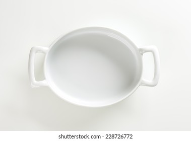 Empty Casserole Dish On White Background