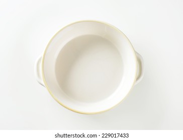 Empty Casserole Dish On White Background