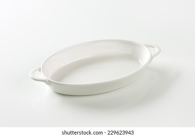 Empty Casserole Dish On White Background