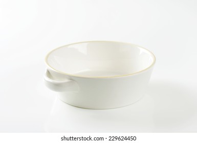Empty Casserole Dish On White Background